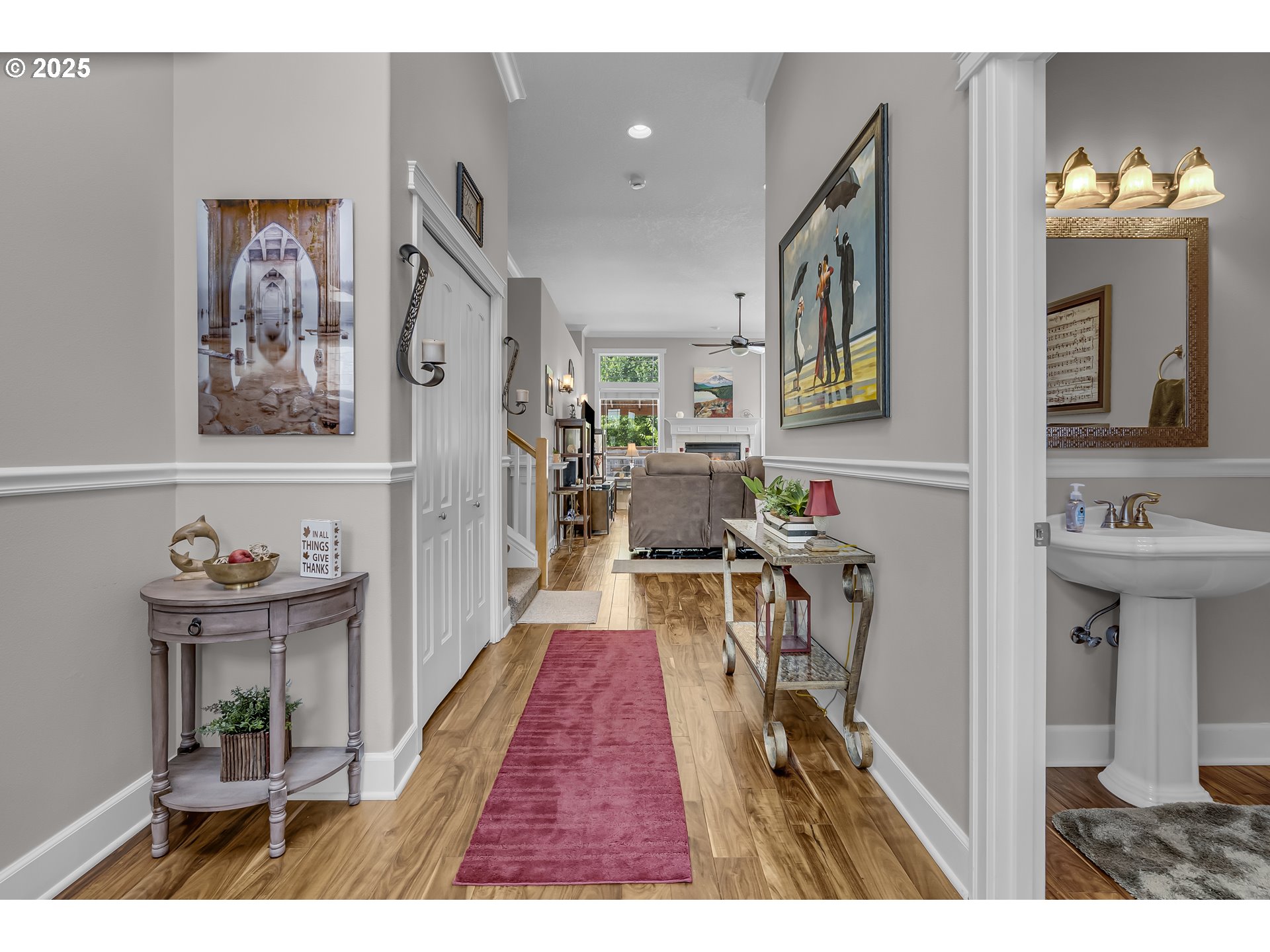 6336 Nicklaus Loop North Keizer, OR 97303 - Photo 8 of 45 a living room with furniture and a chandelier