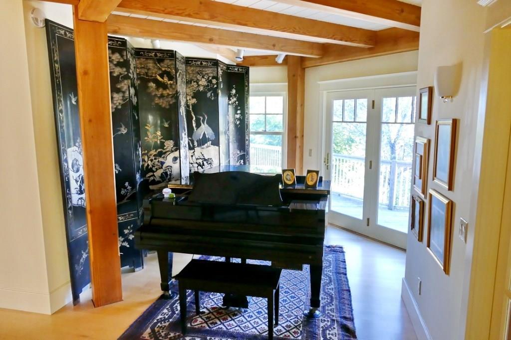 44 Workman Road Gouldsboro, ME 04613 - Photo 21 of 35 The piano room is between the living...