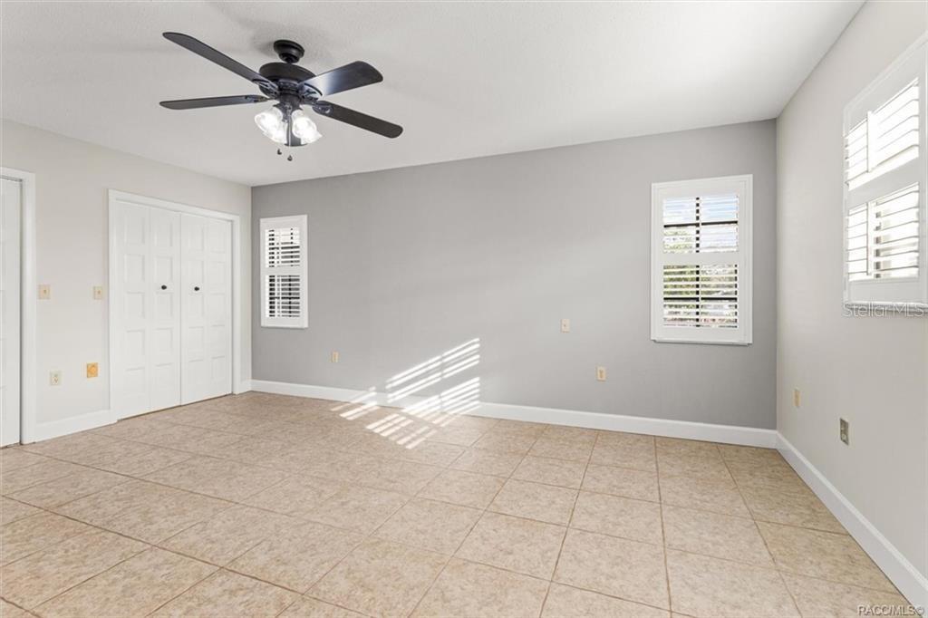 8801 East Cresco Lane Inverness, FL 34450 - Photo 18 of 51 a view of an empty room with a window