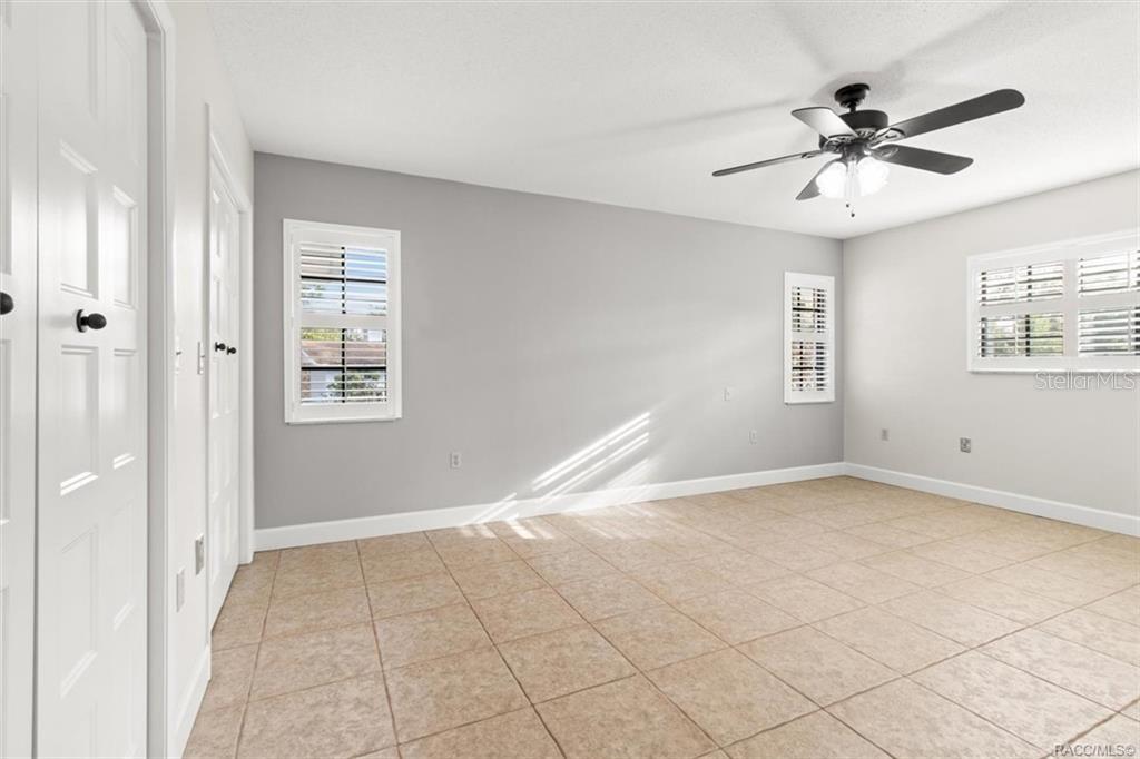 8801 East Cresco Lane Inverness, FL 34450 - Photo 21 of 51 a view of an empty room with a window