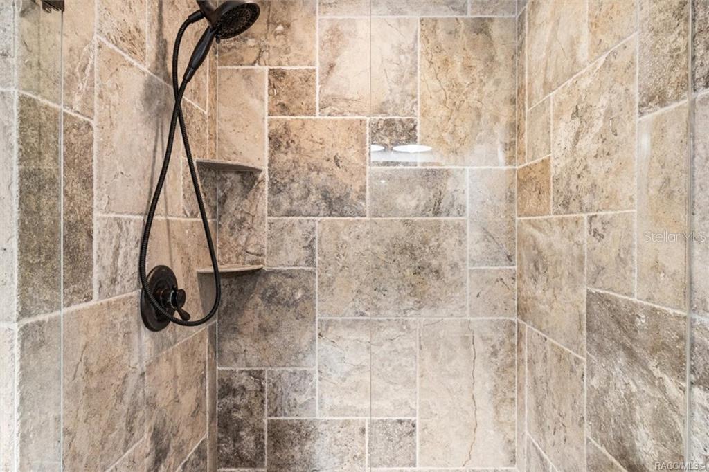 8801 East Cresco Lane Inverness, FL 34450 - Photo 28 of 51 a bathroom with a shower