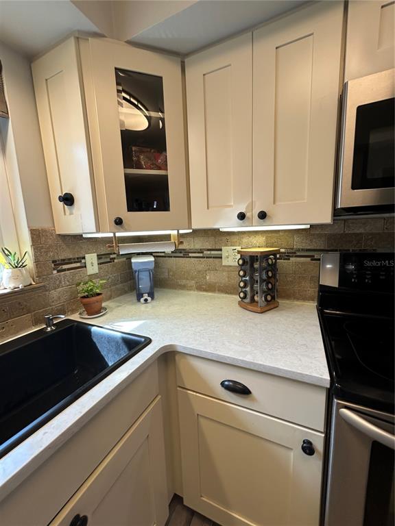 8801 East Cresco Lane Inverness, FL 34450 - Photo 31 of 51 a view of kitchen with granite countertop window and sink