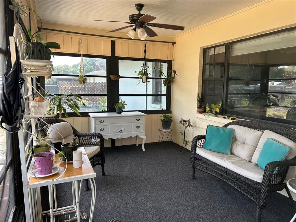 8801 East Cresco Lane Inverness, FL 34450 - Photo 37 of 51 a living room with furniture and a window
