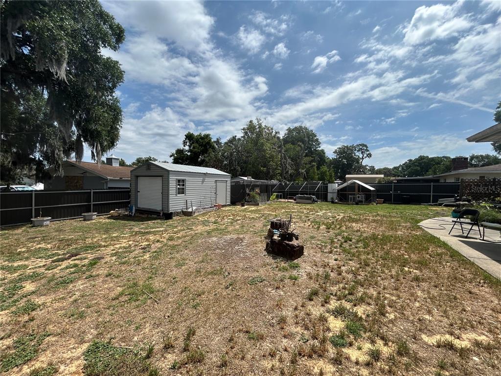 8801 East Cresco Lane Inverness, FL 34450 - Photo 45 of 51 a view of a outdoor space with a garden