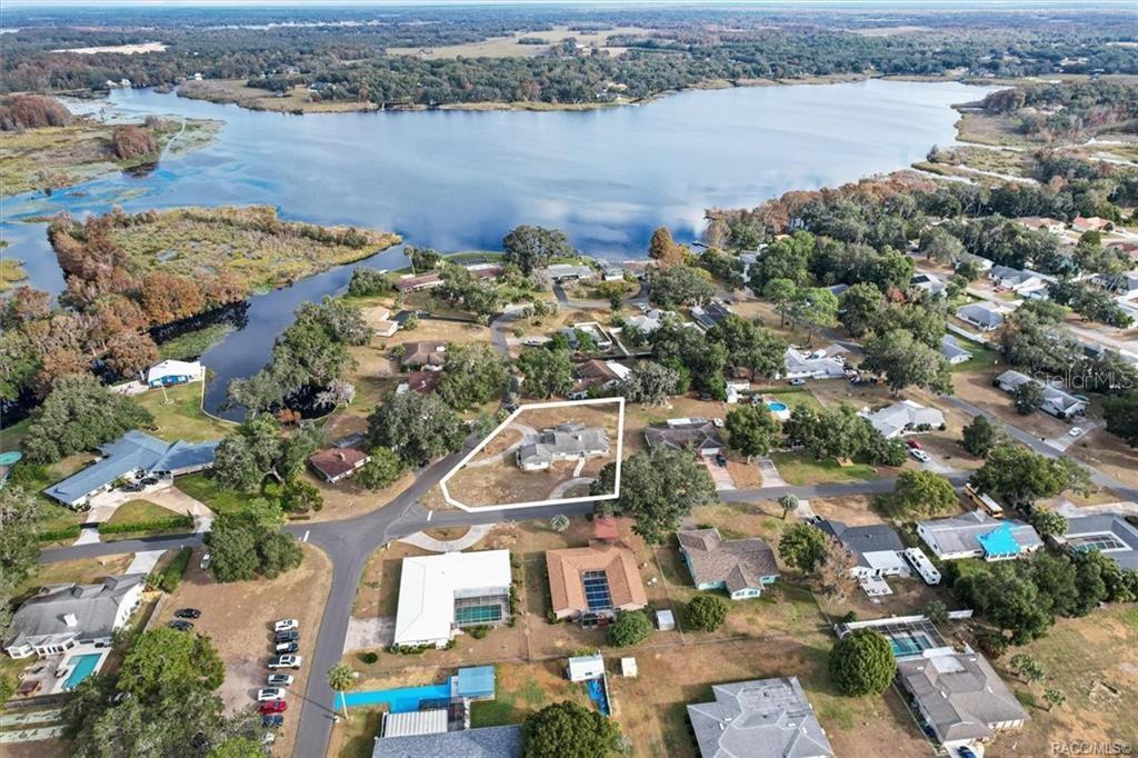 8801 East Cresco Lane Inverness, FL 34450 - Photo 50 of 51 an aerial view of a city with lake view