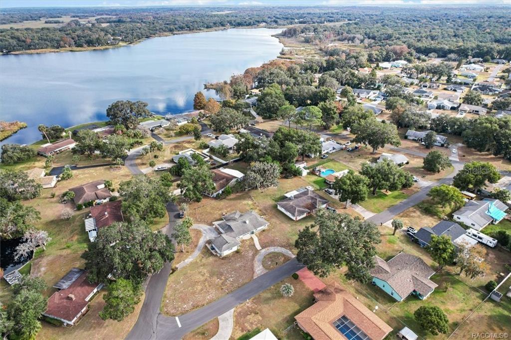 8801 East Cresco Lane Inverness, FL 34450 - Photo 51 of 51 an aerial view of a city with lake view