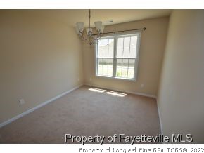 546 Cape Fear Road Raeford, NC 28376 - Photo 6 of 13 a view of an empty room with a window