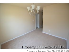 546 Cape Fear Road Raeford, NC 28376 - Photo 7 of 13 a view of a room with rack on the wall