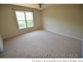 546 Cape Fear Road Raeford, NC 28376 - Photo 9 of 13 an empty room with windows