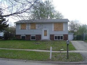 216 Bedford Road Bolingbrook, IL 60440 - Photo 1 of 1 a brick house that has a tree in front of it