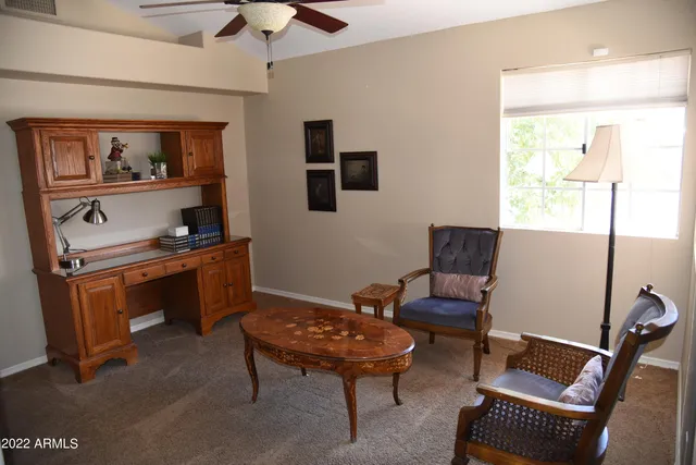 a room with furniture and a window