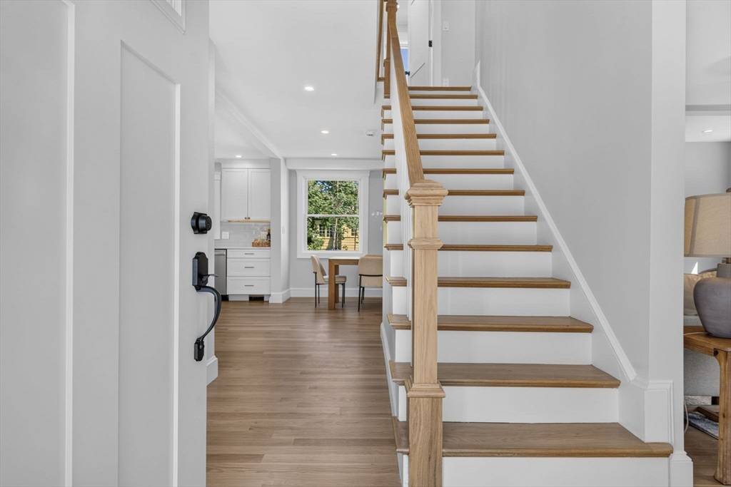 20 Saltonstall Road Medford, MA 02155 - Photo 21 of 41 a view of entryway and hall with wooden floor