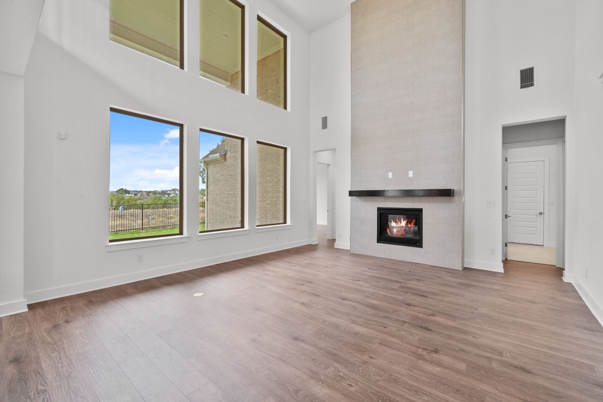 1802 Crimson Sunset Drive Georgetown, TX 78628 - Photo 14 of 38 Family Room with soaring ceiling & fireplace