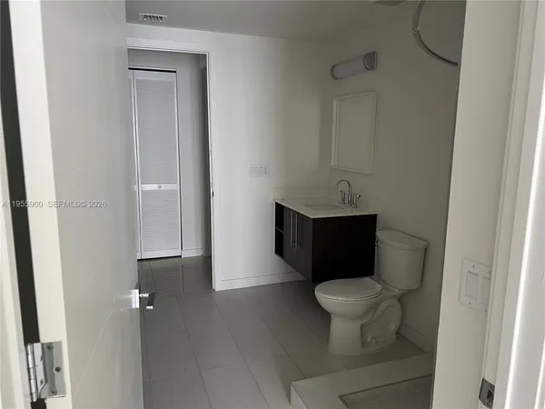 a bathroom with a toilet