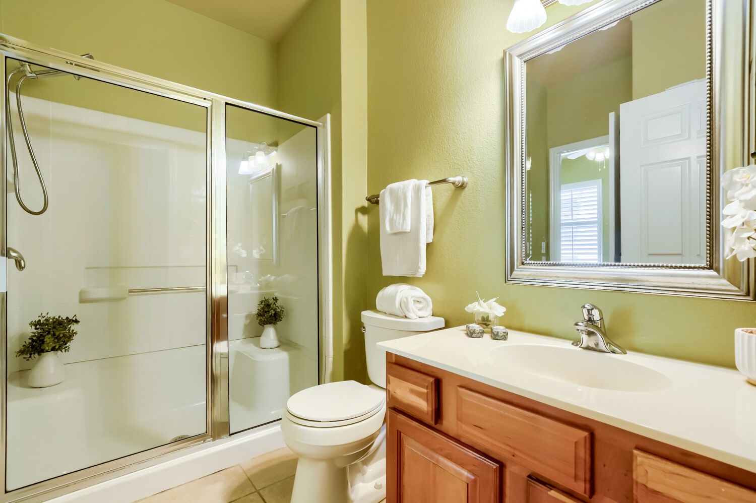 310 Crockett Loop Georgetown, TX 78633 - Photo 15 of 22 Bathroom has entrance from the hallway or from the third bedroom. Beautiful cherry wood cabinets.