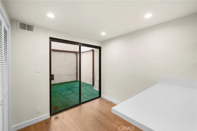 a view of hallway with livingroom