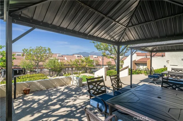 a view of a patio with wooden floor