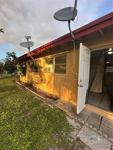 a very nice looking building with glass windows