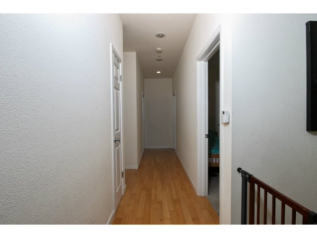 637 Hickey Boulevard Pacifica, CA 94044 - Photo 15 of 15 a view of hallway with wooden floor