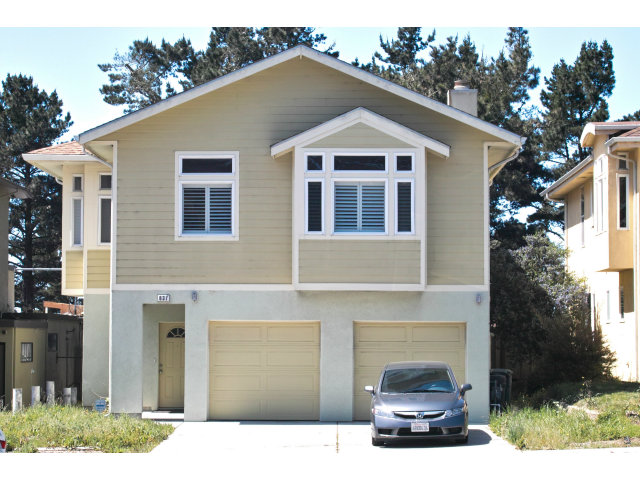 637 Hickey Boulevard Pacifica, CA 94044 - Photo 6 of 15 a front view of a house with a garden
