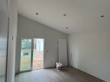 a bathroom with a toilet and a bathtub