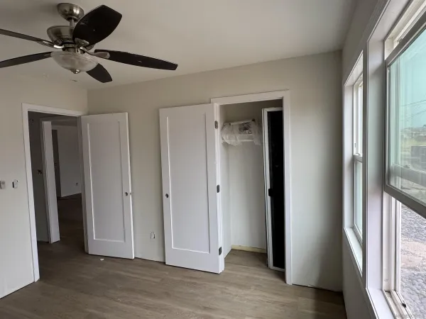a bathroom with a toilet sink and shower