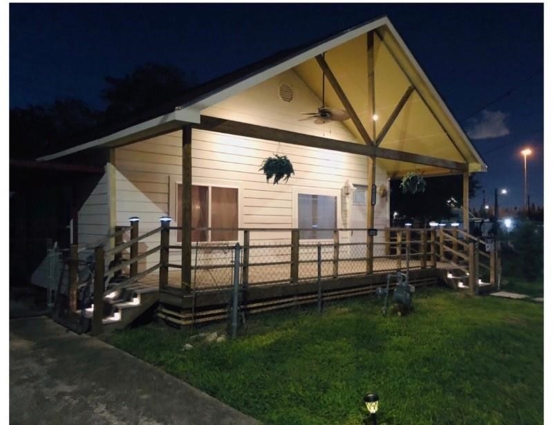 8821 Woodruff Street Houston, TX 77012 - Photo 16 of 20 a view of backyard of house and deck area