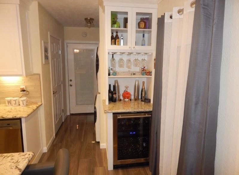 8821 Woodruff Street Houston, TX 77012 - Photo 6 of 20 a very nice looking room with a hallway