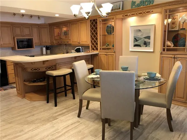 a view of a dining room with furniture
