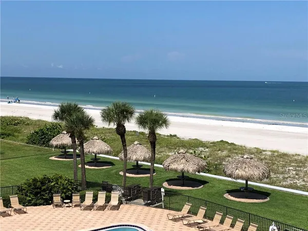 a view of a lake with a yard