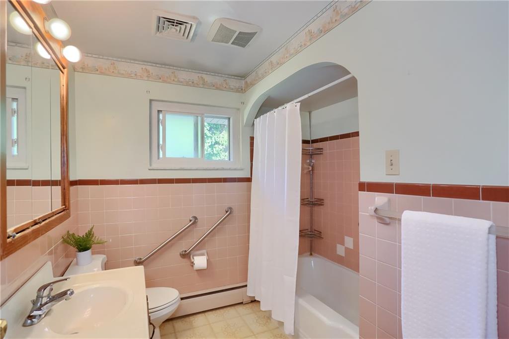 104 Linda Vista Road Sewickley, PA 15143 - Photo 18 of 50 a bathroom with a sink a toilet and shower