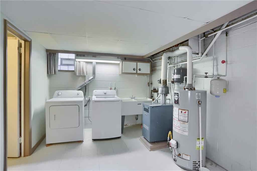 104 Linda Vista Road Sewickley, PA 15143 - Photo 32 of 50 a room with a washing machine