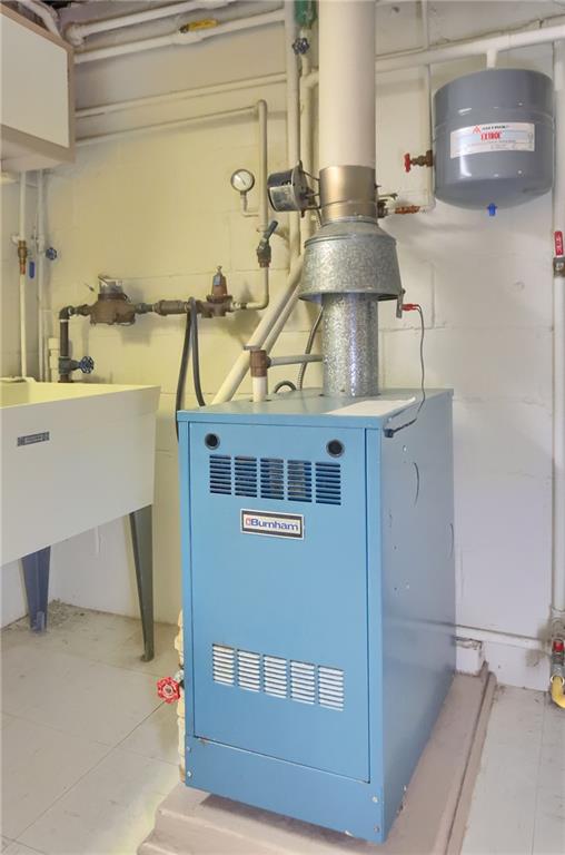104 Linda Vista Road Sewickley, PA 15143 - Photo 33 of 50 a view of a kitchen with a sink and cabinets