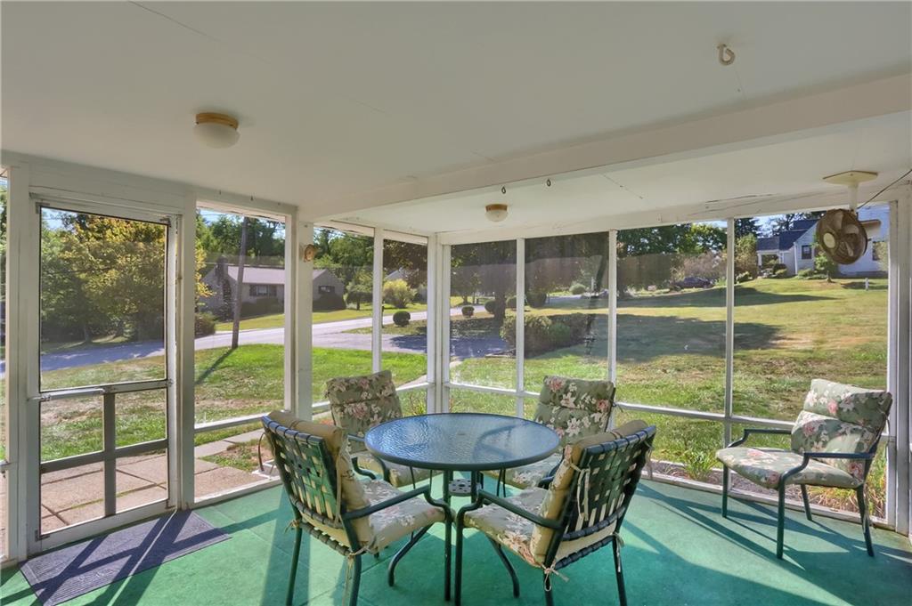 104 Linda Vista Road Sewickley, PA 15143 - Photo 37 of 50 a view of a dining room with furniture window and outside view