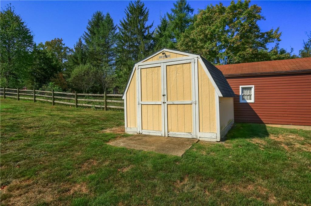 104 Linda Vista Road Sewickley, PA 15143 - Photo 45 of 50 a backyard of a house with lots of green space and trampoline