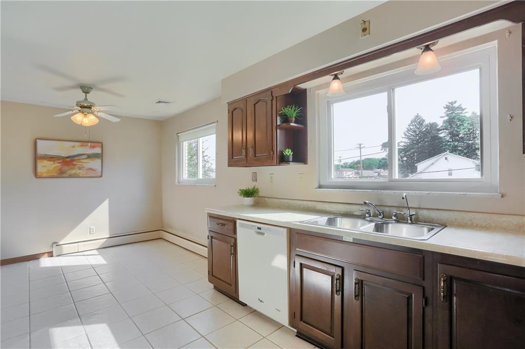 104 Linda Vista Road Sewickley, PA 15143 - Photo 9 of 50 a bathroom with a sink vanity and a mirror