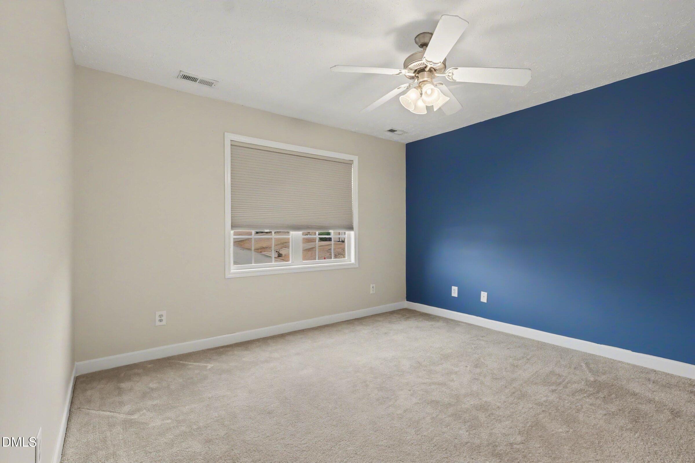 615 Lenoir Drive Spring Lake, NC 28390 - Photo 19 of 39 a view of an empty room with a window