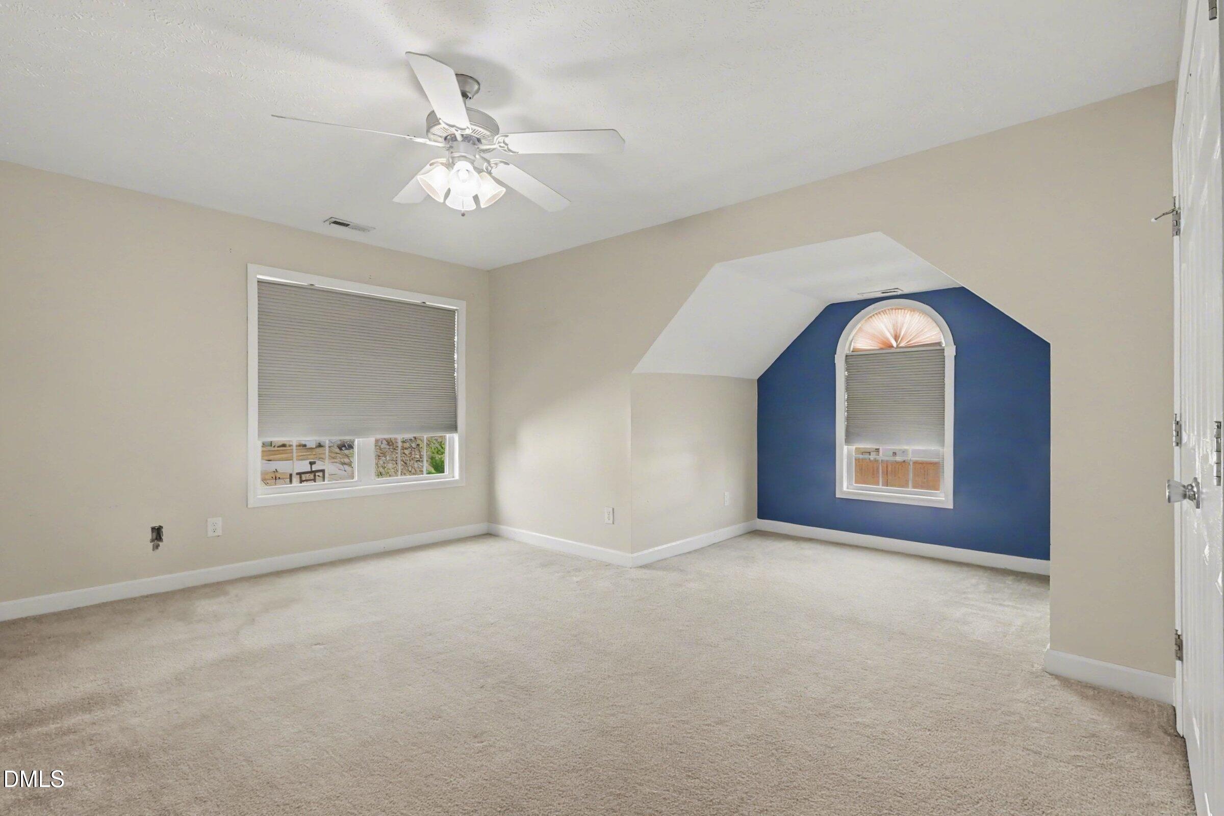 615 Lenoir Drive Spring Lake, NC 28390 - Photo 22 of 39 a view of an empty room with a window