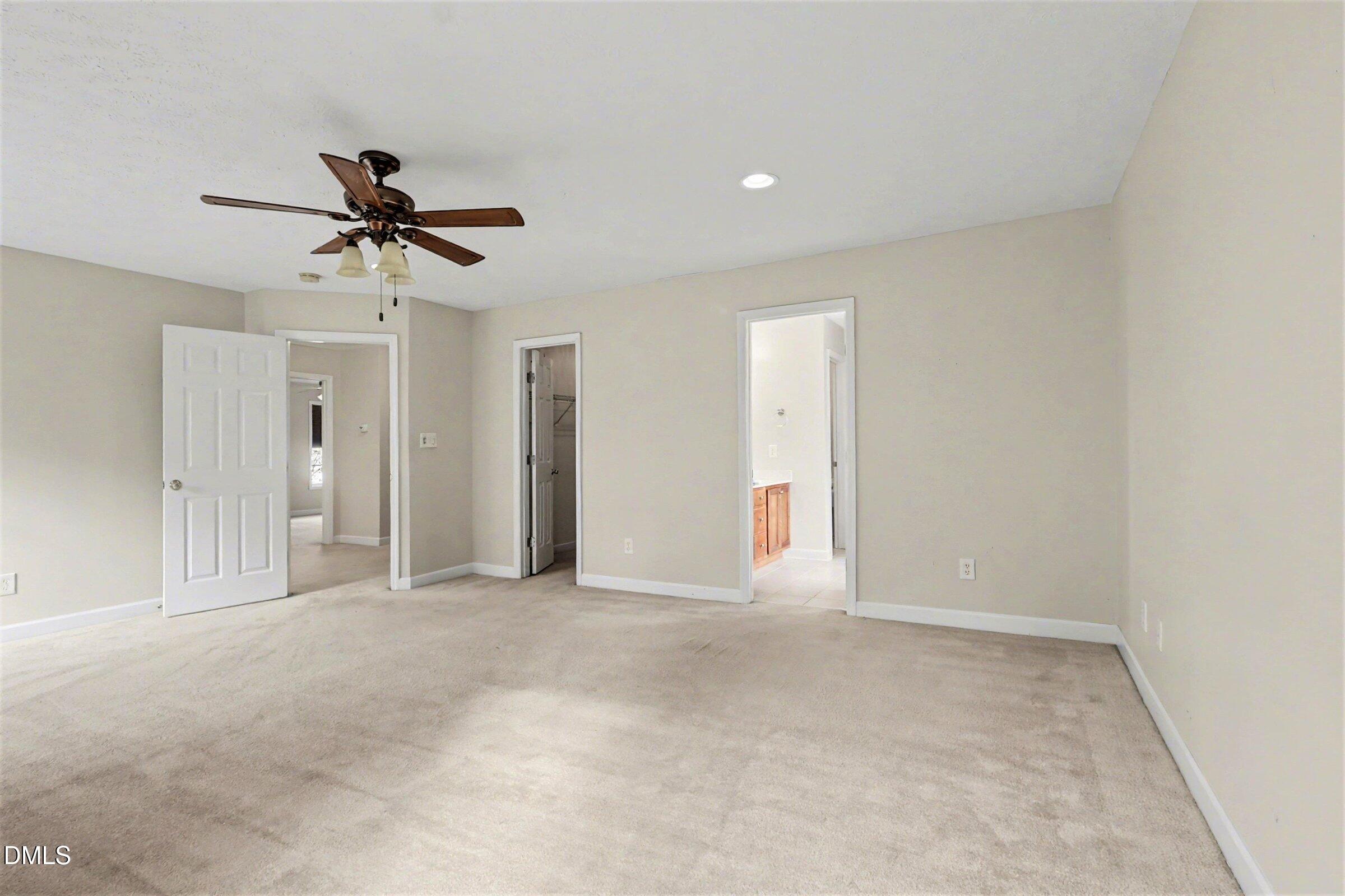 615 Lenoir Drive Spring Lake, NC 28390 - Photo 24 of 39 a view of empty room with a ceiling fan