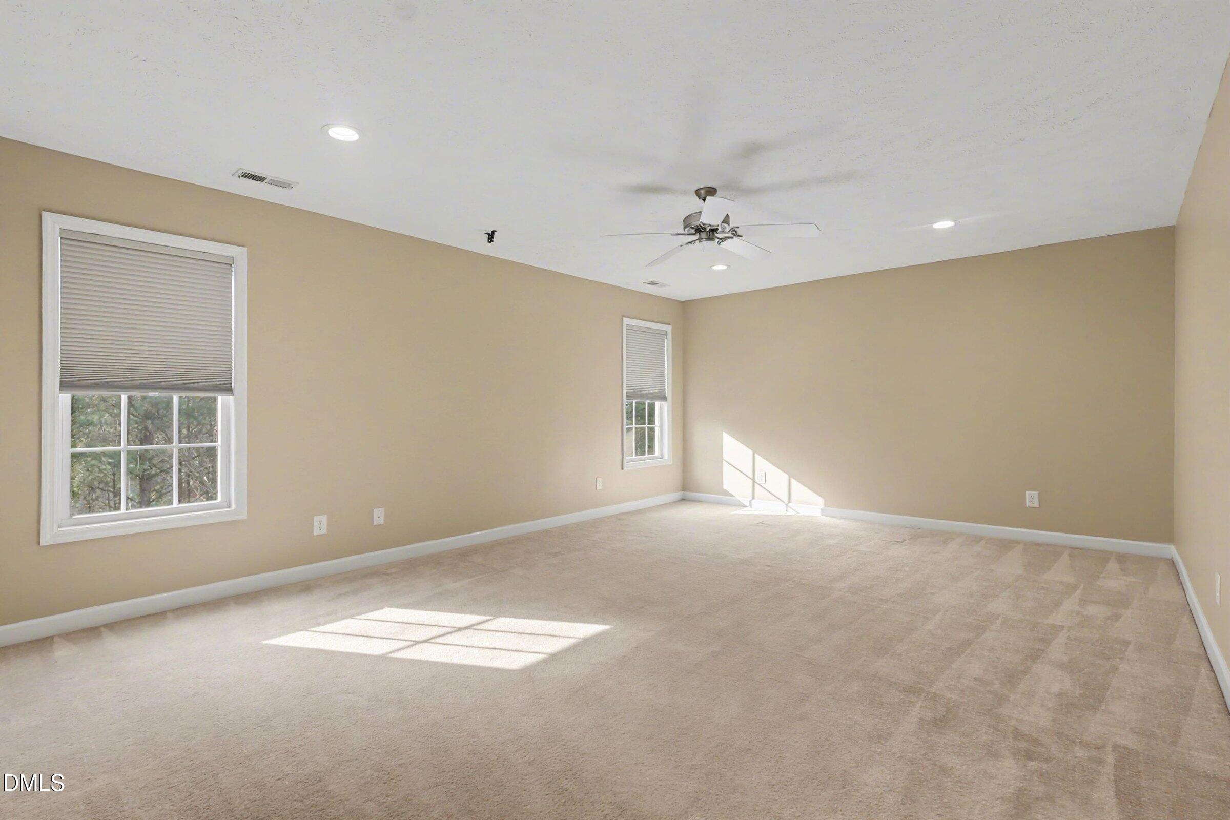 615 Lenoir Drive Spring Lake, NC 28390 - Photo 33 of 39 a view of empty room with windows