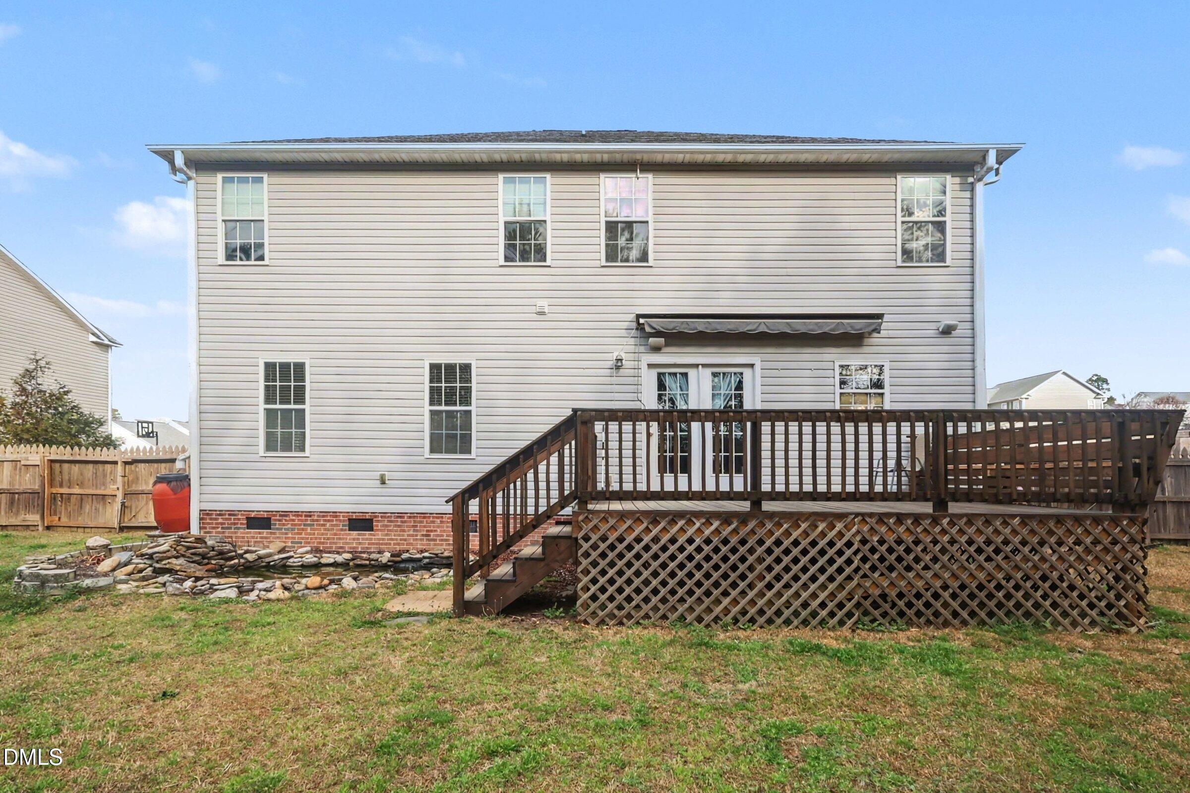 615 Lenoir Drive Spring Lake, NC 28390 - Photo 36 of 39 a view of a brick house with many windows