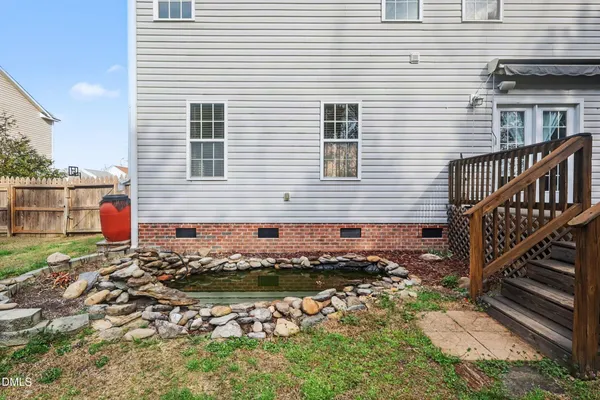 a front view of a house with backyard