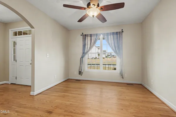 a view of an empty room and window