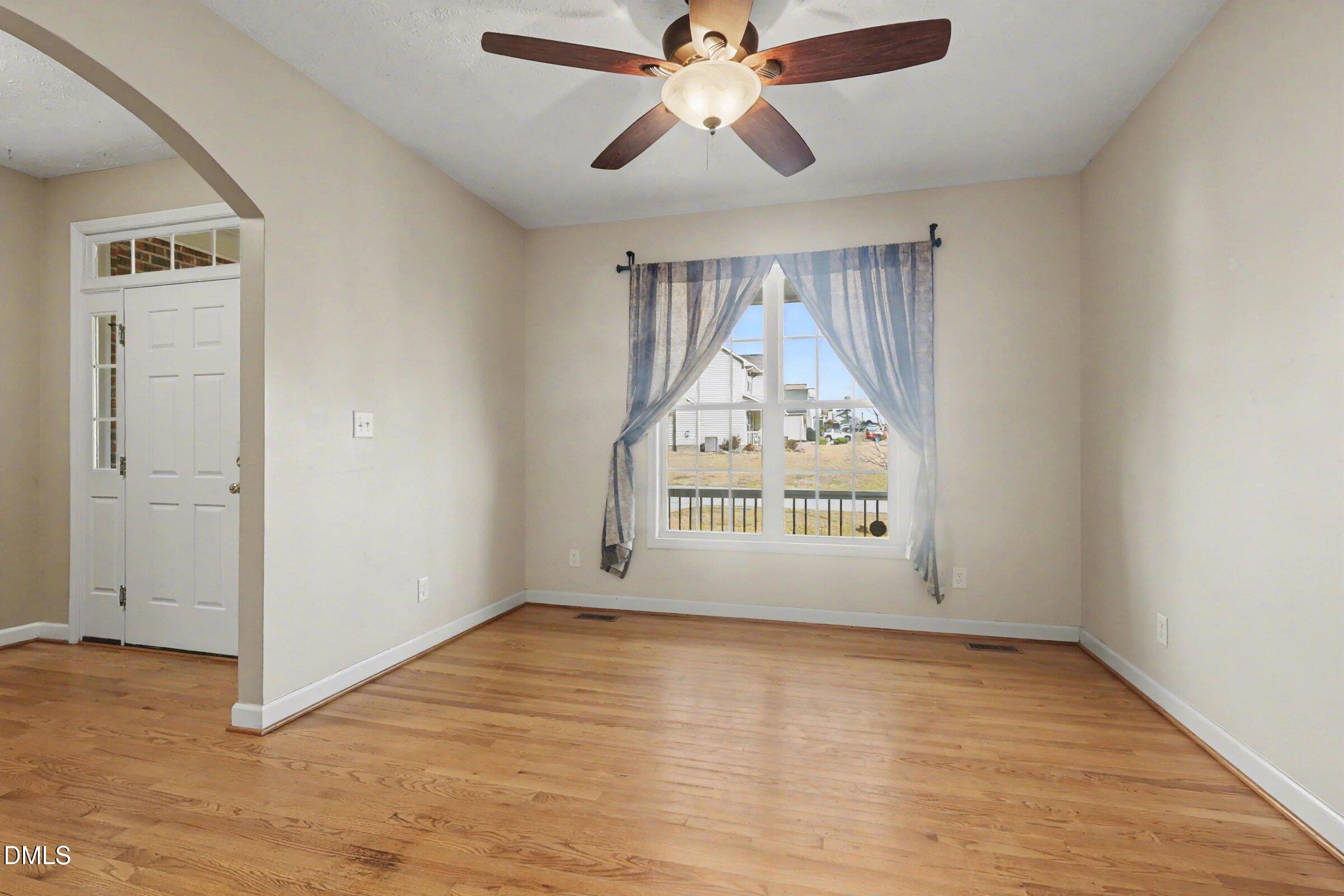 615 Lenoir Drive Spring Lake, NC 28390 - Photo 4 of 39 a view of an empty room and window