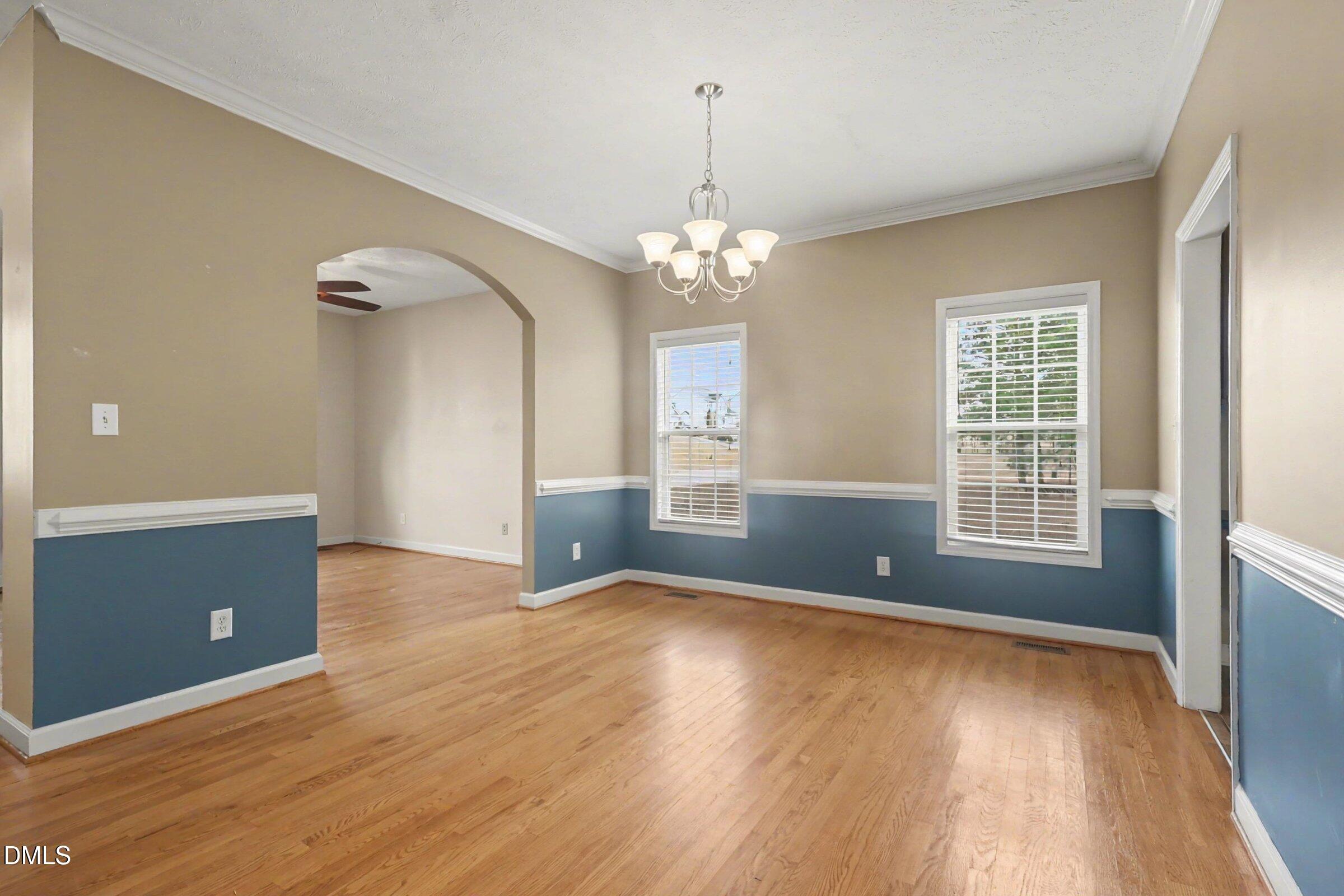 615 Lenoir Drive Spring Lake, NC 28390 - Photo 9 of 39 wooden floor in an empty room with a window