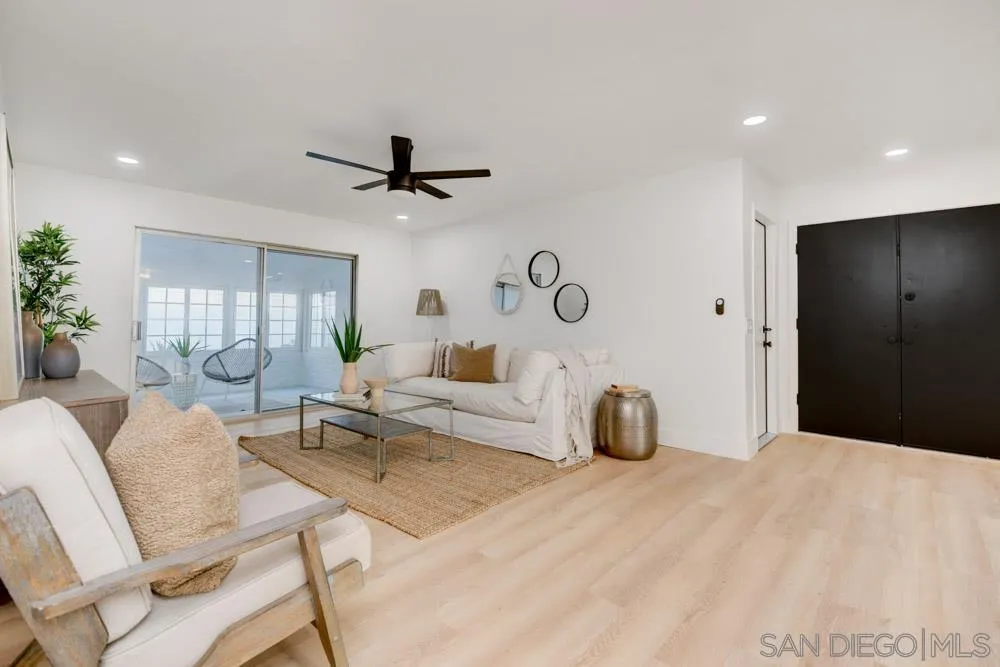 9428 Leticia Drive Santee, CA 92071 - Photo 1 of 17 a living room with furniture and a potted plant