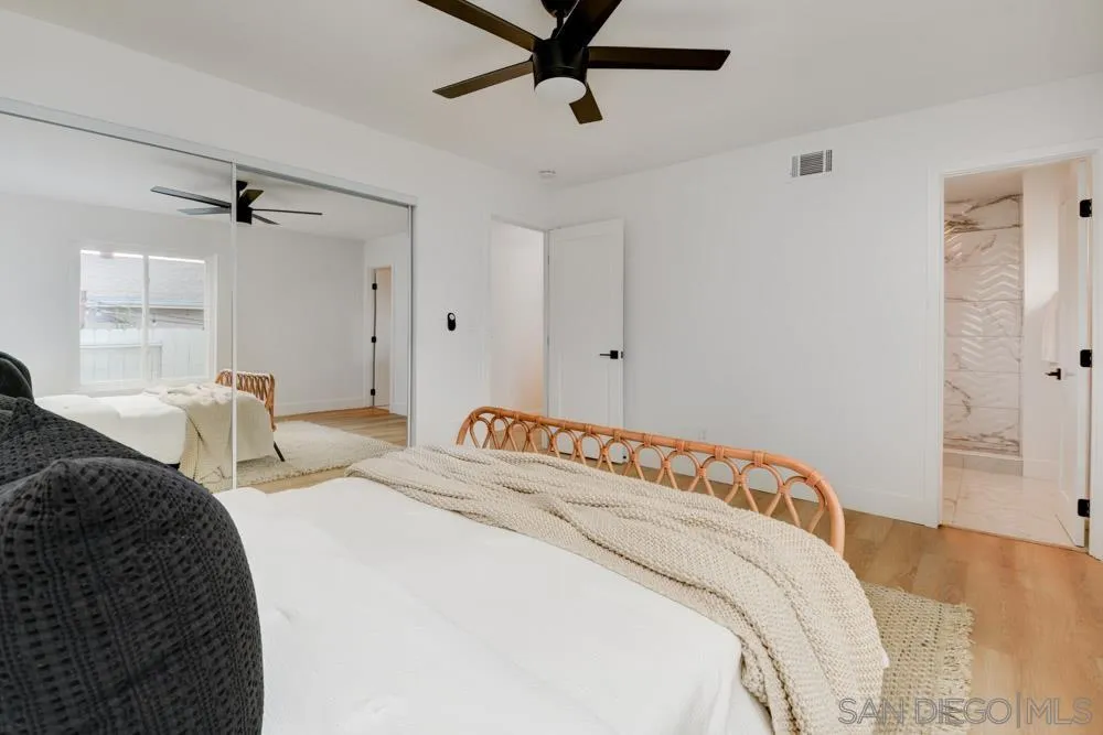 9428 Leticia Drive Santee, CA 92071 - Photo 10 of 17 a bedroom with bed and window