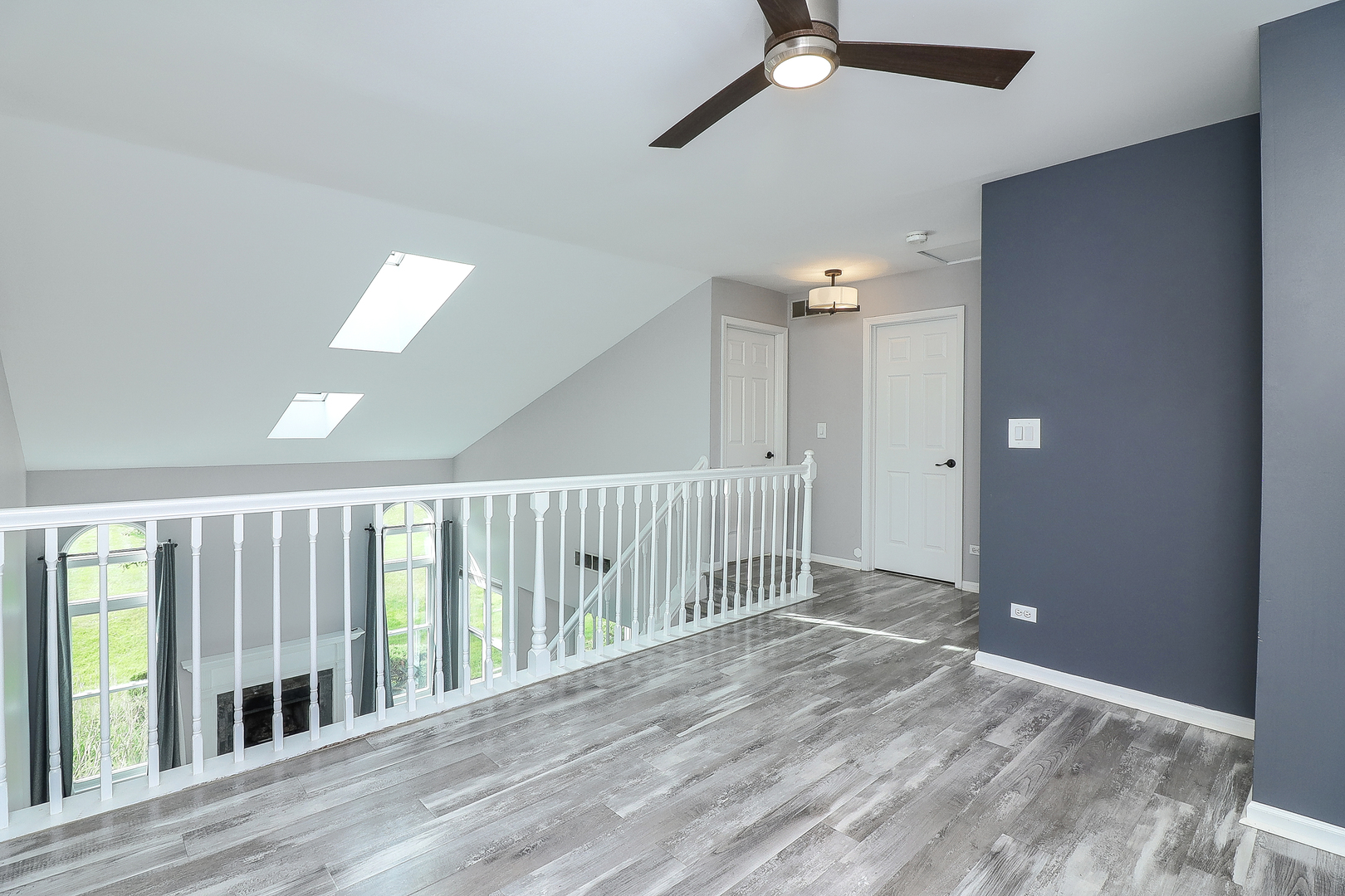 1288 Lakeshore Drive Carol Stream, IL 60188 - Photo 13 of 25 a view of a hallway with wooden floor