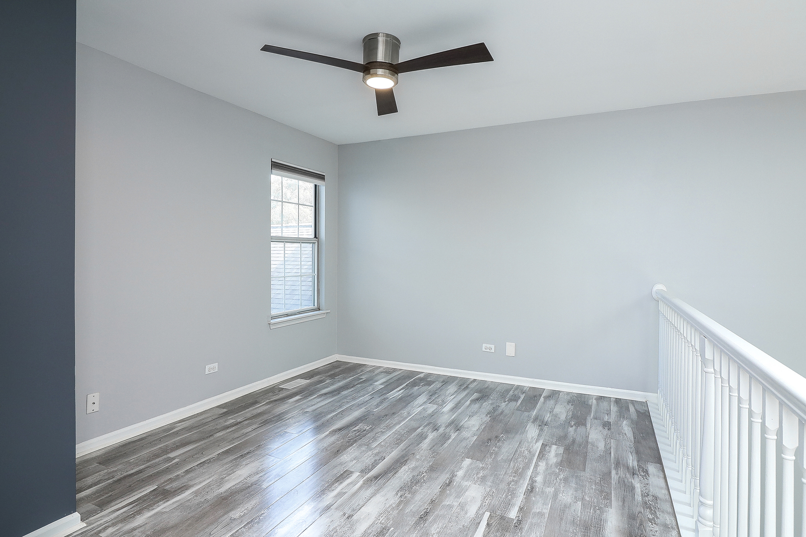 1288 Lakeshore Drive Carol Stream, IL 60188 - Photo 14 of 25 wooden floor in an empty room with a window