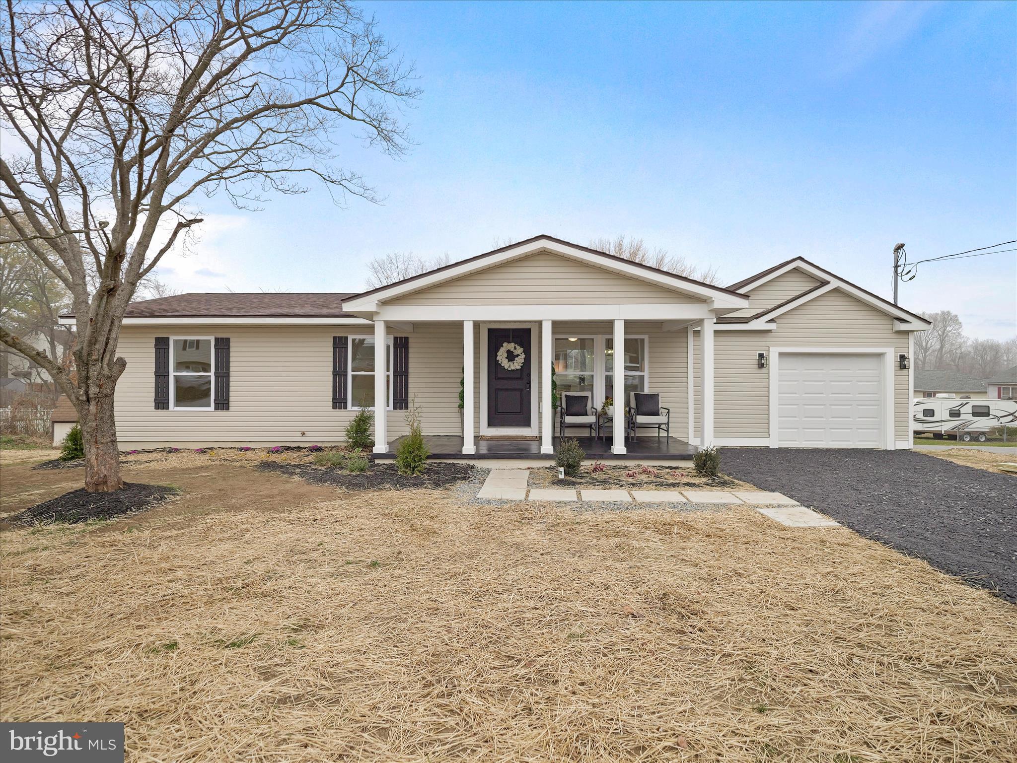 front view of a house with a yard